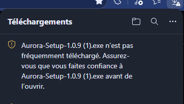 Edge's downloads panel, in French: the file isn't commonly downloaded; make sure you trust it before opening it.